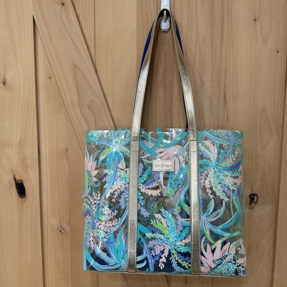Lilly Pulitzer Handbags - Lilly Pulitzer Clear PVC Sweet Escape Print Tote Flora Beach Bag Gold Trim